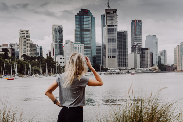 Blonde girl in Brisbane City watching a Brisbane hail storm with large hail
